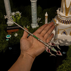 Lightscale Trident replica (29cm die-cast zinc alloy) — held in hand for scale.