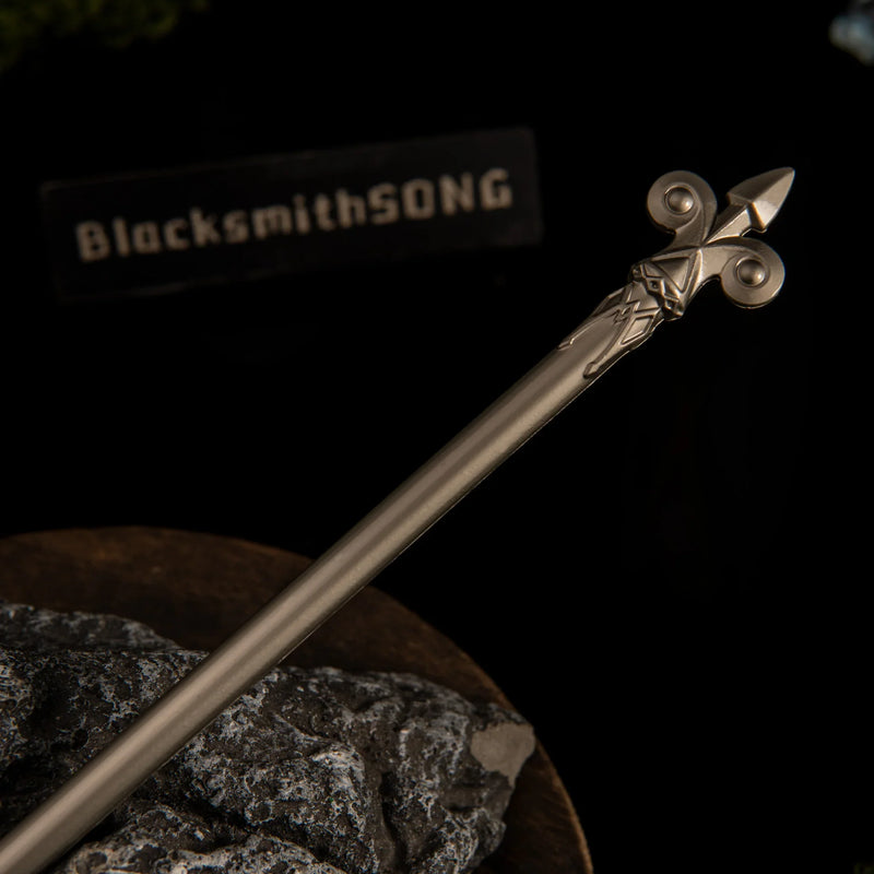 Lightscale Trident replica — woven-look grip and shaft detail close-up on stone.