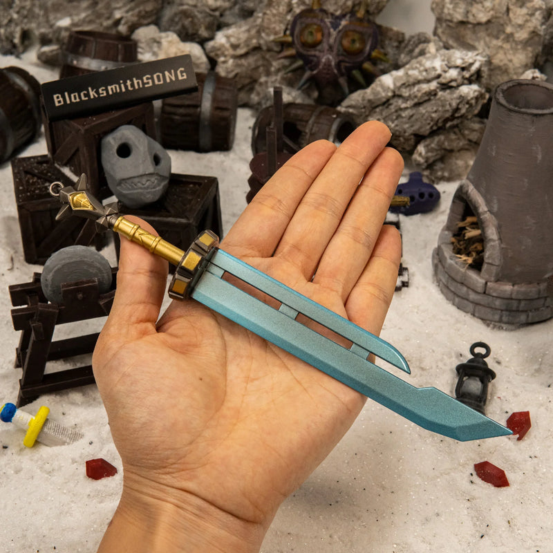 Razor Sword replica (20.5cm die-cast zinc alloy sword) — held in hand for scale.