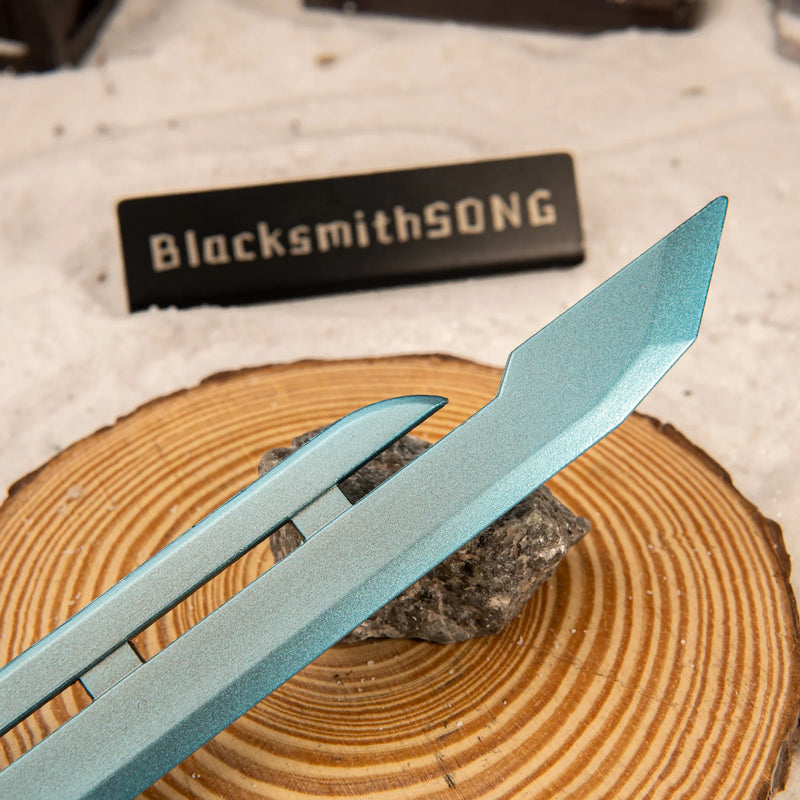 Razor Sword replica — curved blade and center groove close-up.