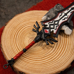 Royal Guard's Claymore replica — flared crossguard and red-inset center panel close-up.