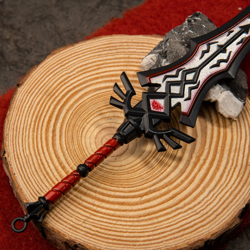 Royal Guard's Claymore replica — flared crossguard and red-inset center panel close-up.