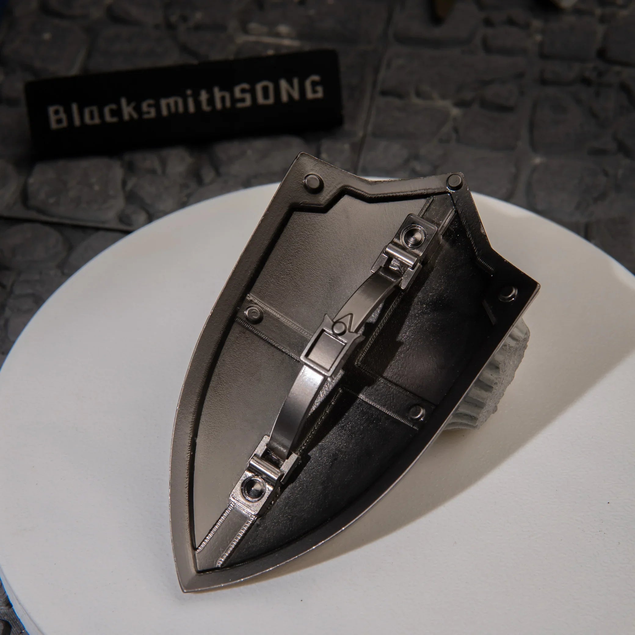 Rear view of the 1/6 scale Royal Guard's Shield replica, showing the solid, rigid cast-metal handle and forearm strap.