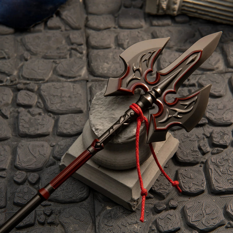 Royal Guard's Spear replica — axe-head crossguard and scrollwork close-up.