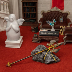 Royal Halberd replica (21.5cm die-cast zinc alloy halberd) — resting across a stone in a handcrafted royal receiving-hall diorama, by BlacksmithSONG.