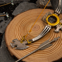 Savage Lynel Bow replica — gold center ring and joint detail close-up.