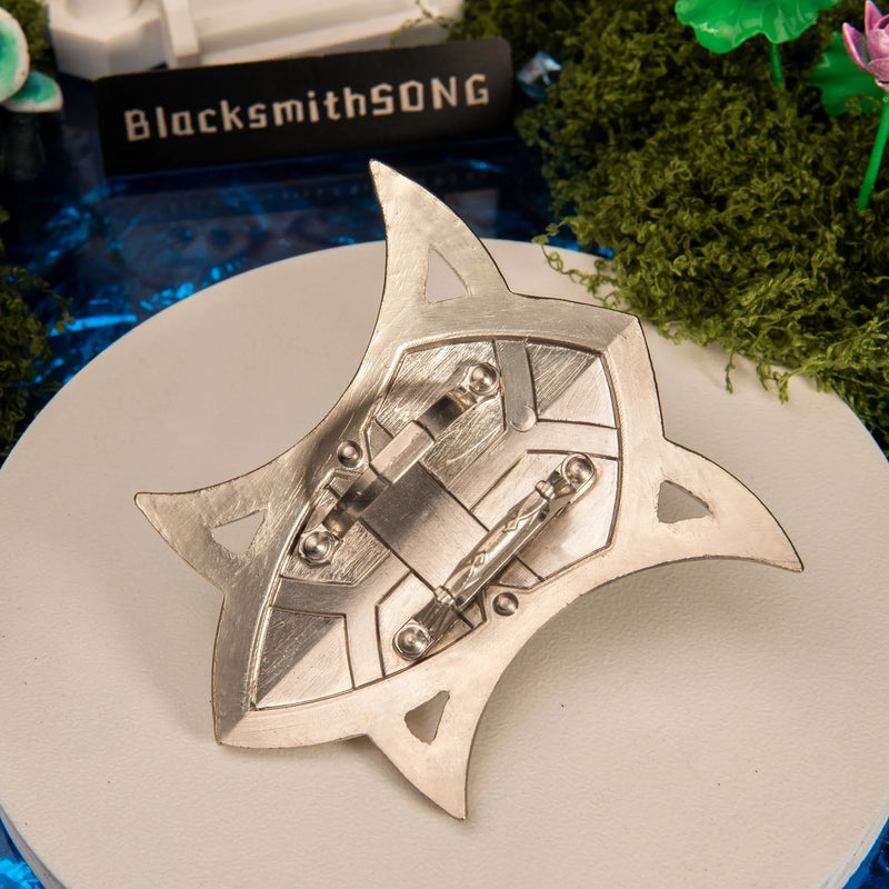 Silver Shield replica — back view showing the arm-strap fitting.