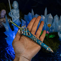 Zora Sword replica (21cm die-cast zinc alloy sword) — held in hand for scale.
